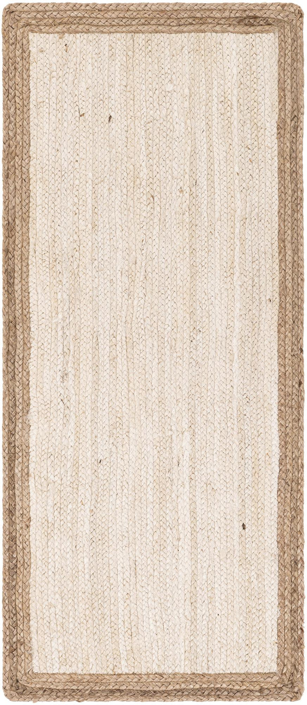 Cream and natural jute runner rug with handwoven texture styled in a bright hallway with wooden flooring and neutral furniture