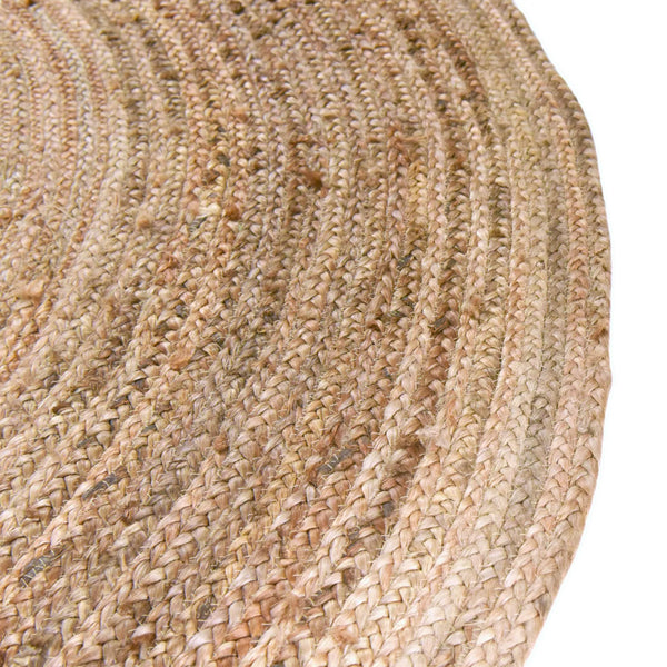 Round handwoven natural jute rug with braided spiral weave design in earthy brown and tan tones for boho rustic home décor.