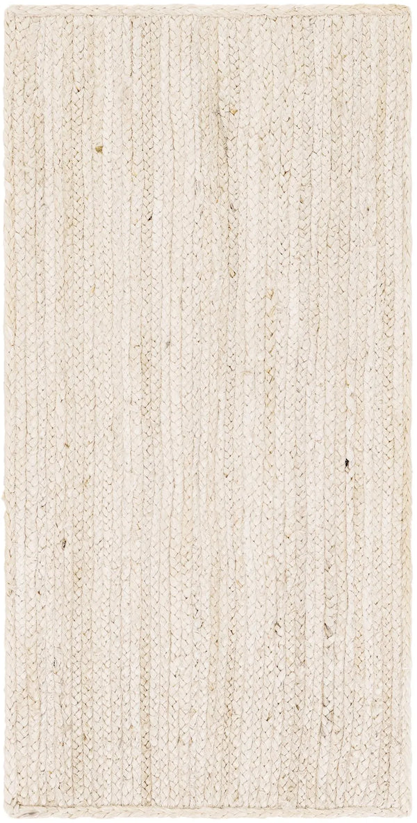 "Handwoven cream and natural jute runner rug laid on a light oak wooden floor in a brightly lit room next to a wooden bench and potted fiddle leaf fig plant."