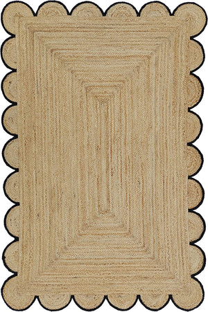Handmade natural braided jute rug with black scalloped border displayed in a modern boho living room, eco-friendly woven area rug for living room, bedroom, farmhouse and minimalist home decor.