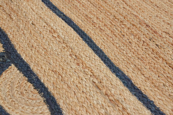 Handwoven natural jute area rug with navy blue scalloped border, eco-friendly braided rectangular rug for modern boho farmhouse living room decor.
