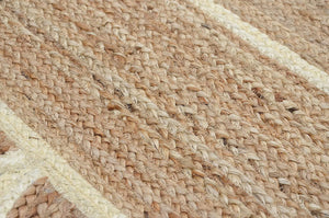 Handwoven natural jute area rug in beige and off-white with scalloped edge border for living room and bedroom