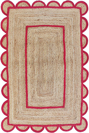 Handwoven natural jute area rug with bold red scalloped border and braided rectangular design
