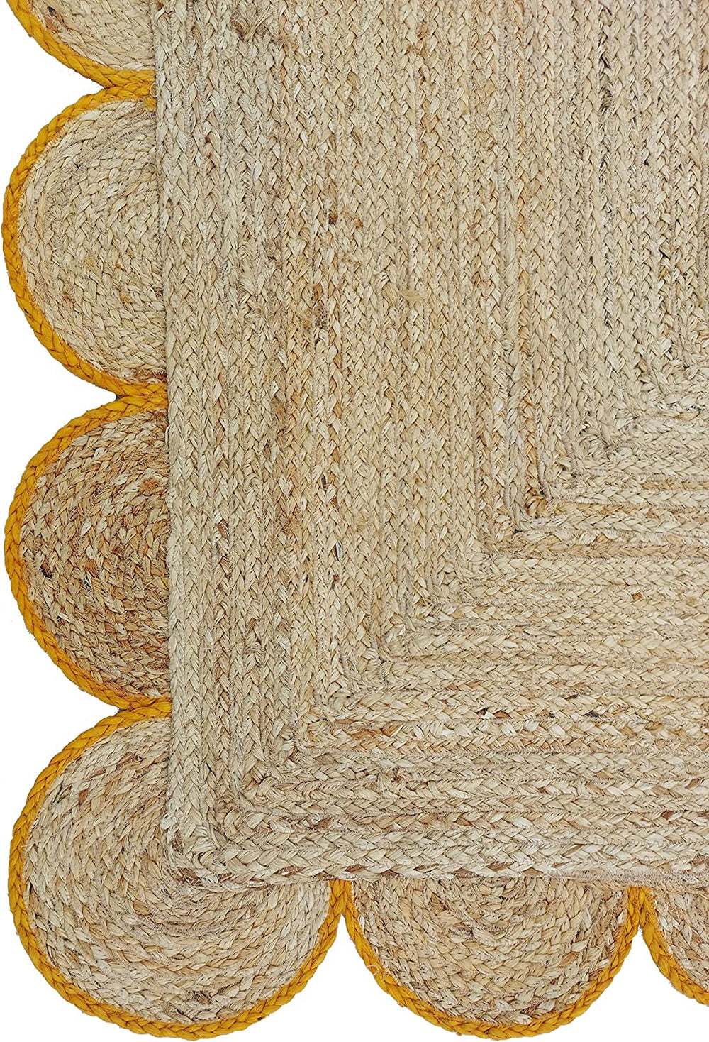 Handwoven Natural Jute Area Rug with Mustard Scalloped Border Styled in a Modern Scandinavian Living Room