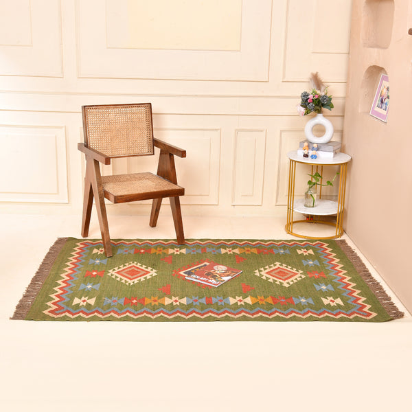Handwoven green Kilim area rug with colorful tribal geometric pattern, handmade wool cotton flatweave boho rug for living room and bedroom.