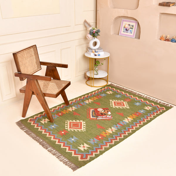 Handwoven green Kilim area rug with colorful tribal geometric pattern, handmade wool cotton flatweave boho rug for living room and bedroom.