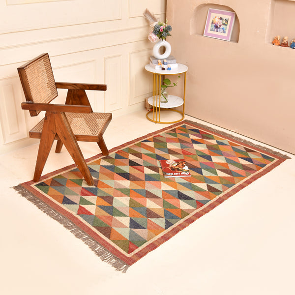 Handwoven multicolor geometric kilim area rug featuring colorful triangle patterns in wool and natural jute for living room, bedroom, hallway, and modern home décor.