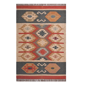 Handmade wool jute kilim area rug featuring Southwestern tribal geometric patterns in beige, charcoal, rust, and ivory for boho farmhouse home décor.
