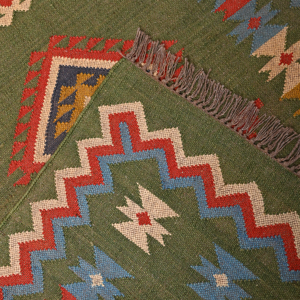 Handwoven green Kilim area rug with colorful tribal geometric pattern, handmade wool cotton flatweave boho rug for living room and bedroom.