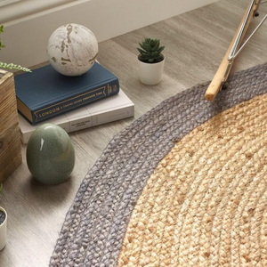 Round natural jute rug with gray border for living room decor