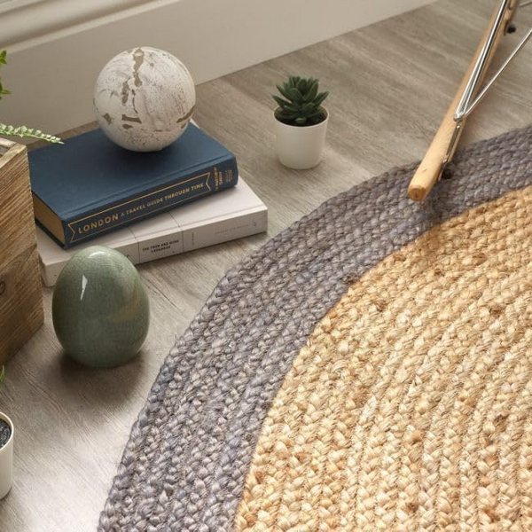 Round natural jute rug with gray border for living room decor