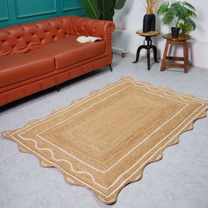 Handwoven natural hemp rug with scalloped white wavy border in beige